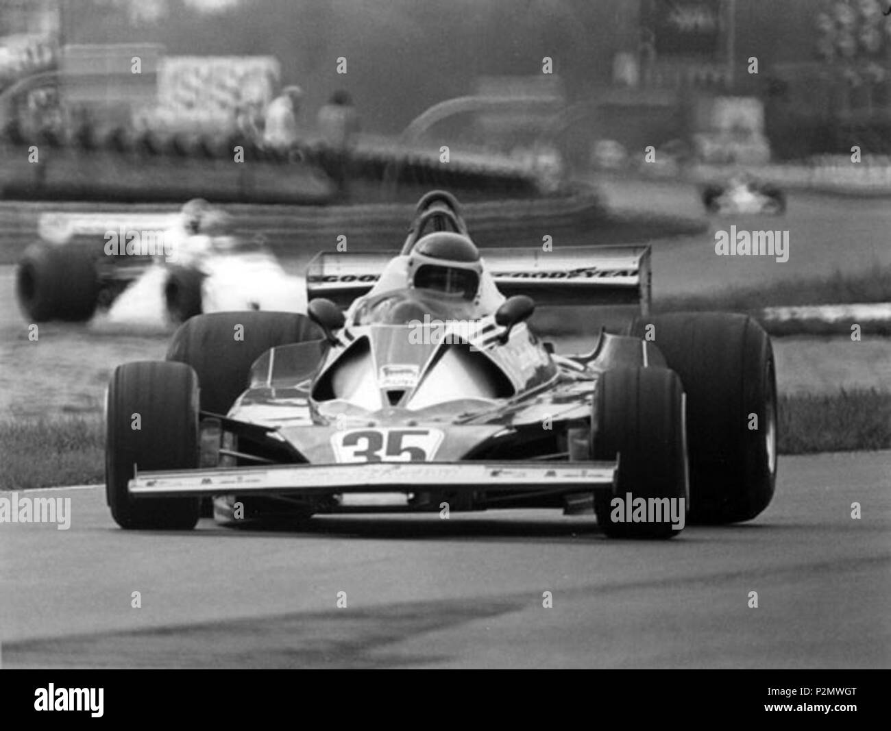 . English: Carlos Reutemann in the 1976 Italian Grand Prix at the wheel of Ferrari No. 35 Italiano: Carlos Reutemann nel Gran Premio d'Italia 1976 al volante della Ferrari nr. 35 . 19 January 2013, 15:44:35. Carlos Ghys 75 Reutemann GP Italia 1976 Stock Photo