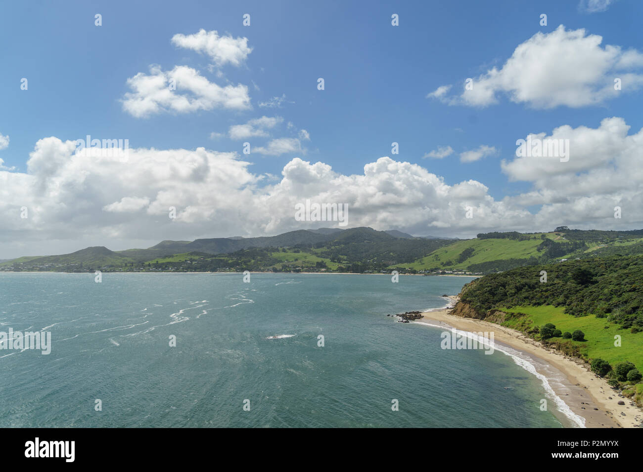 aerial view of ocean coastline on sunny summer day, Omapere, New Zealand Stock Photo