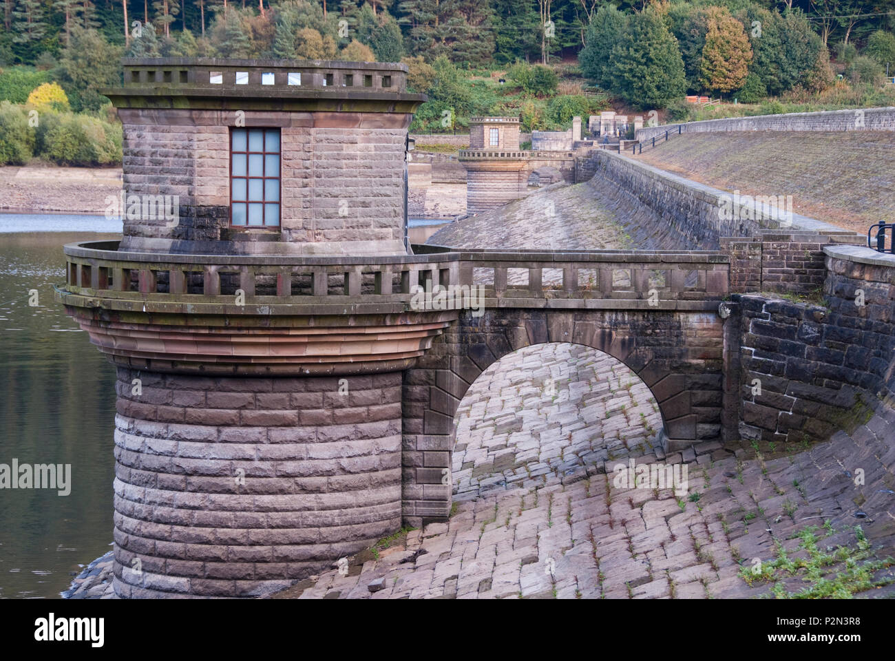 DERBYSHIRE UK - 06 Oct : Ladybower reservoir dam head wall path and draw off tower exposed by low water level on 06 Oct 2013 in the Peak District, UK Stock Photo