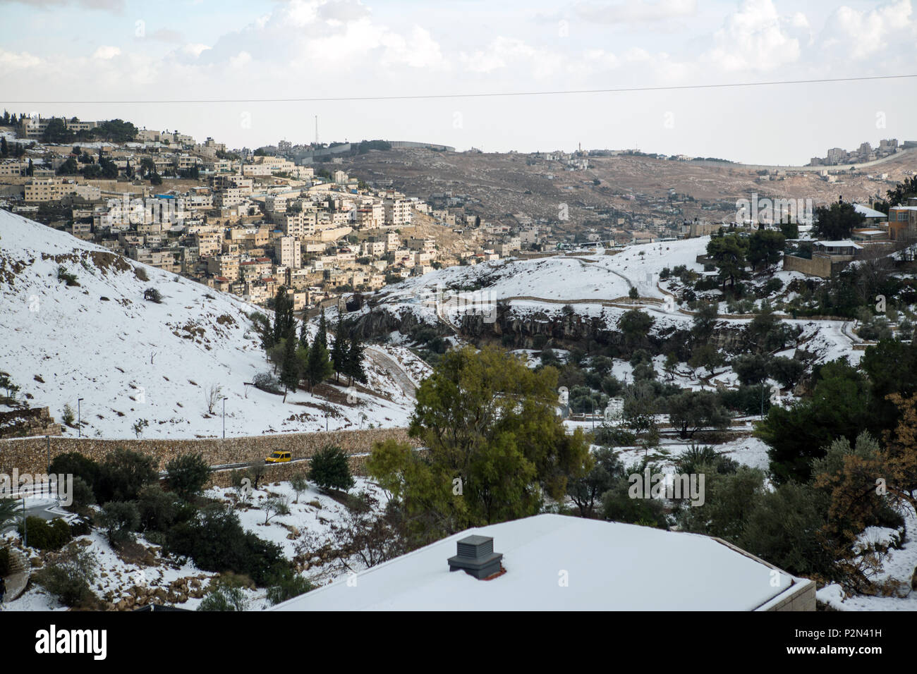 Jerusalem old city and villages around during a snow storm Stock Photo ...