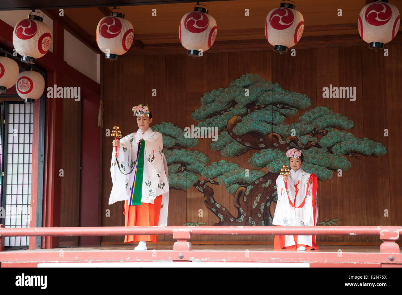 Girl und young woman dancing in traditional costume during Sanja Matsuri in Asakusa, Taito-ku, Tokyo, Japan Stock Photo