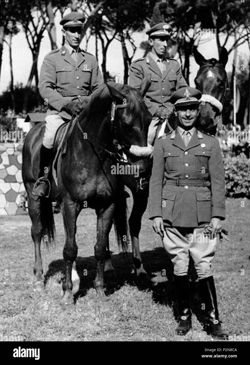 . Piero D'Inzeo, Raimondo D'Inzeo and Antonio Gutierrez in Piazza di Siena, Rome - Italy in 1960s . 1960s. Unknown 71 Piero and Raimondo D'Inzeo with Antonio Gutierrez Stock Photo