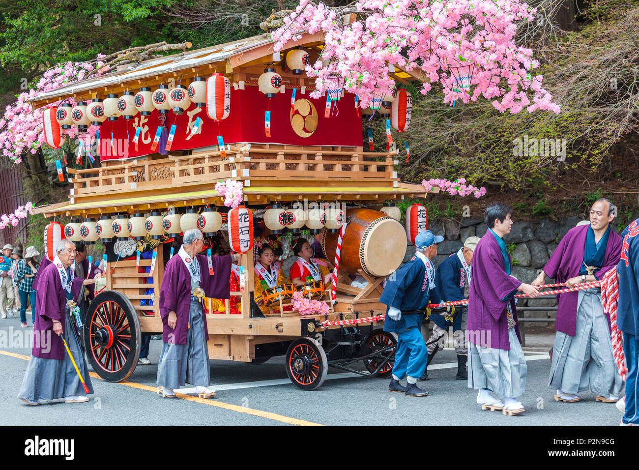 Decorated festival wagon with girls playing music during Yayoi Matsuri in Nikko, Tochigi Prefecture, Japan Stock Photo