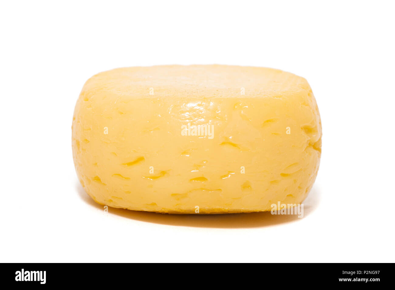Yellow goat cheese isolated on a white background Stock Photo Alamy
