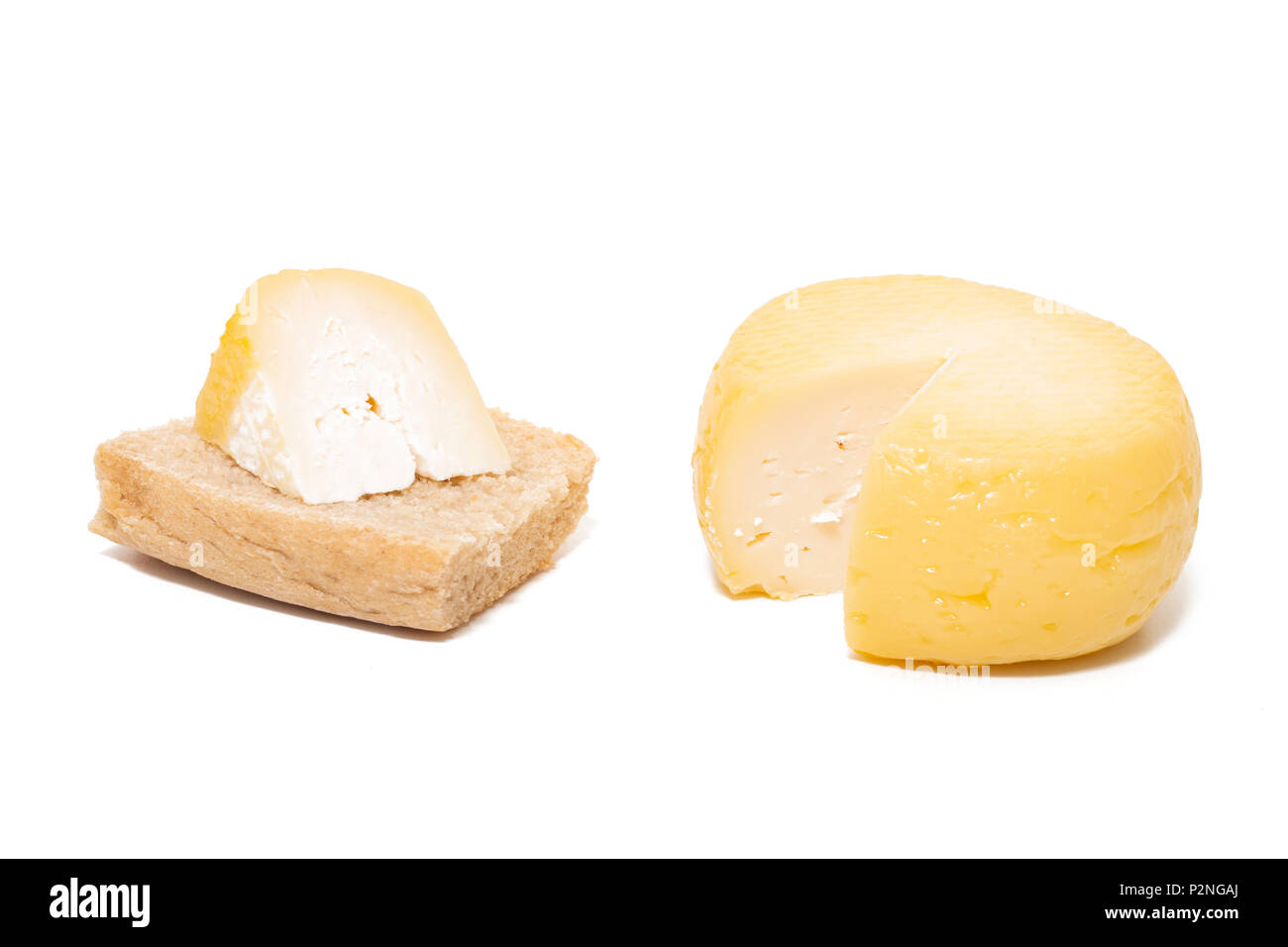 Yellow goat cheese isolated on a white background Stock Photo Alamy