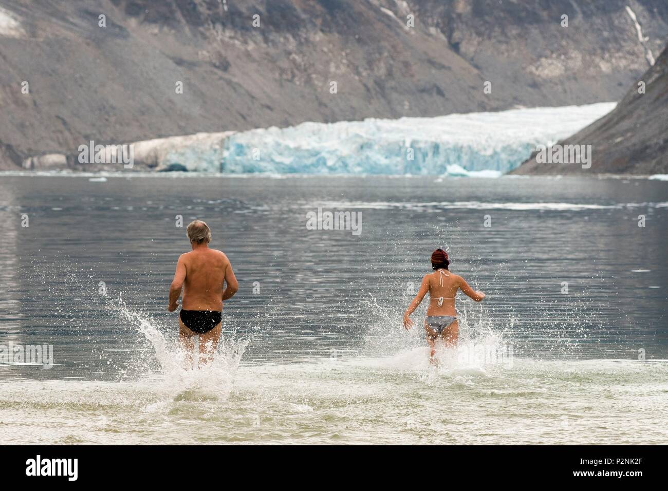 Norway, Svalbard, Spitsbergen, Magdalenafjorden, 2 swimmers Stock Photo