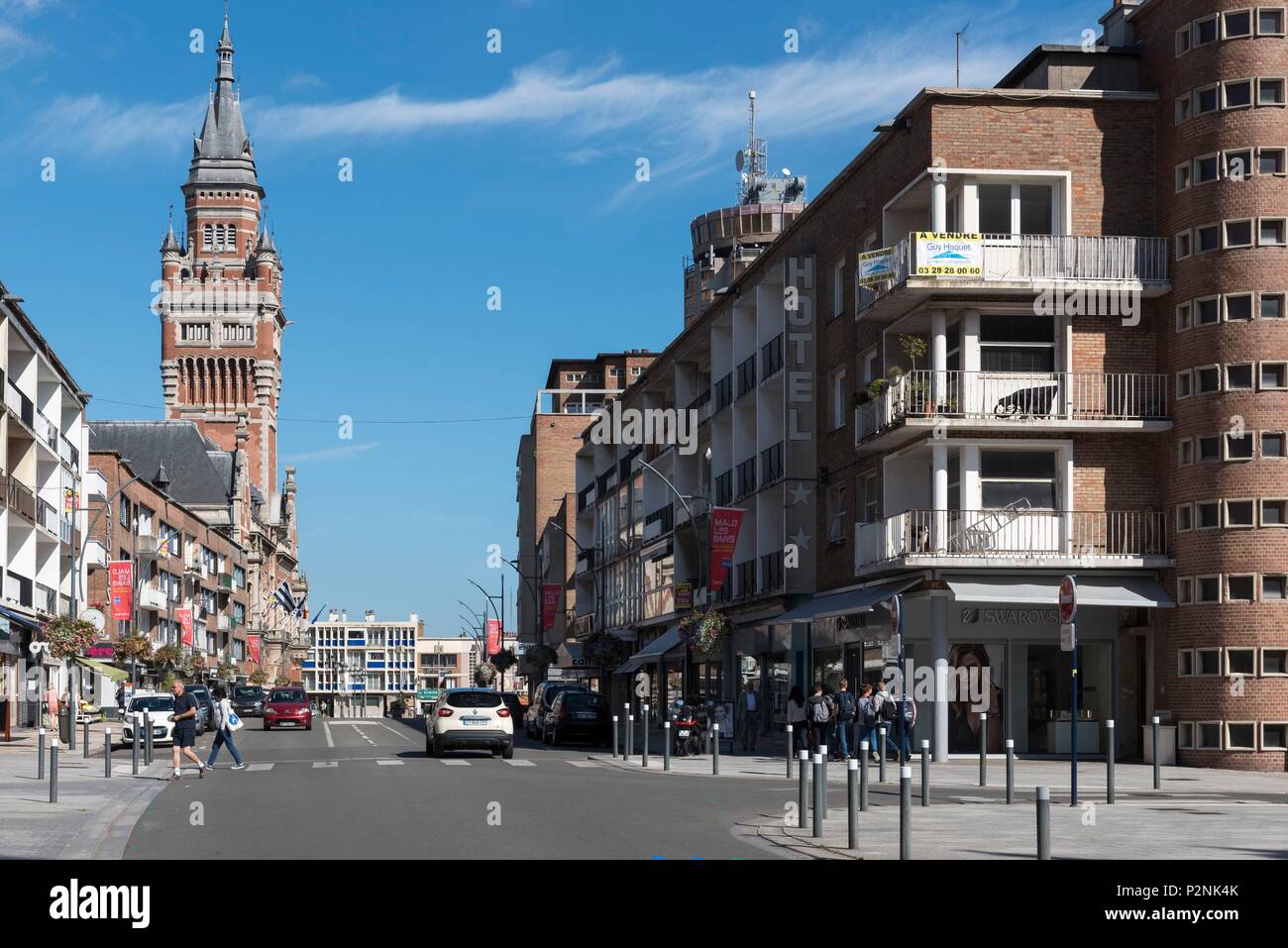 France, Nord, Dunkirk, street of the city centre dominated by the belfry of the town hall listed as World Heritage by UNESCO Stock Photo