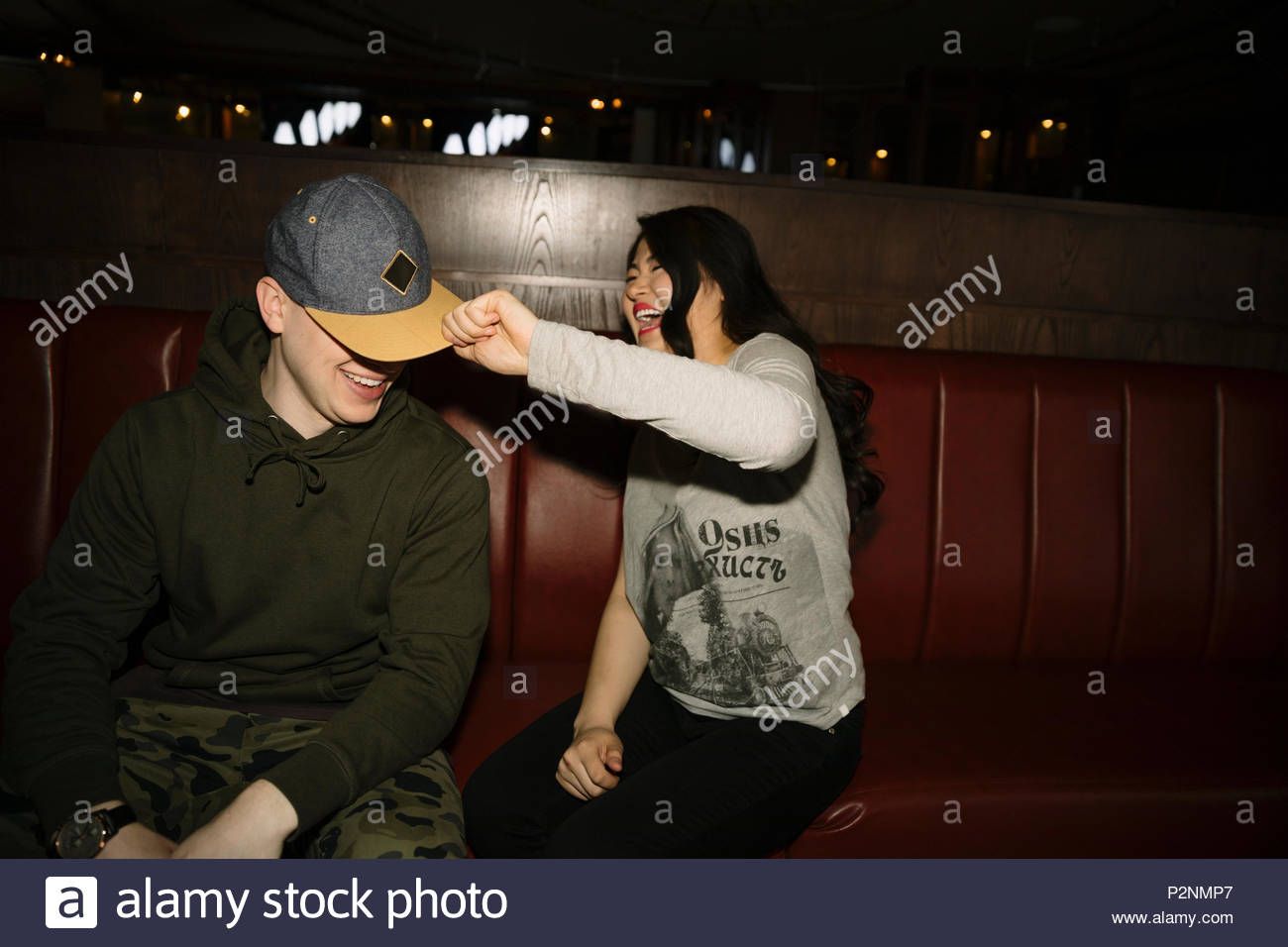 Young men hanging out nightclub hi-res stock photography and images - Alamy