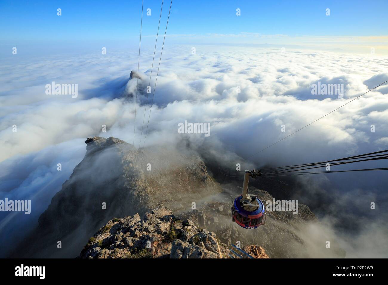 South Africa, Western Cape, Table Mountain cable car coming out of the fog at the top of Table Mountain National Park Stock Photo