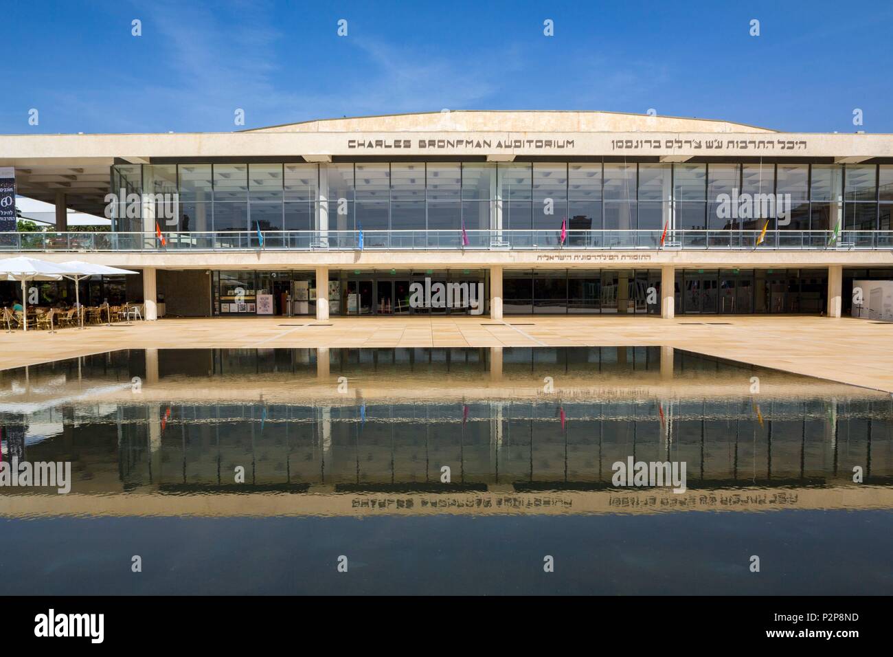 Israel, Tel Aviv-Jaffa, the city center, Habima Square, the cultural center Charles Bronfman Auditorium reflecting in a water basin Stock Photo