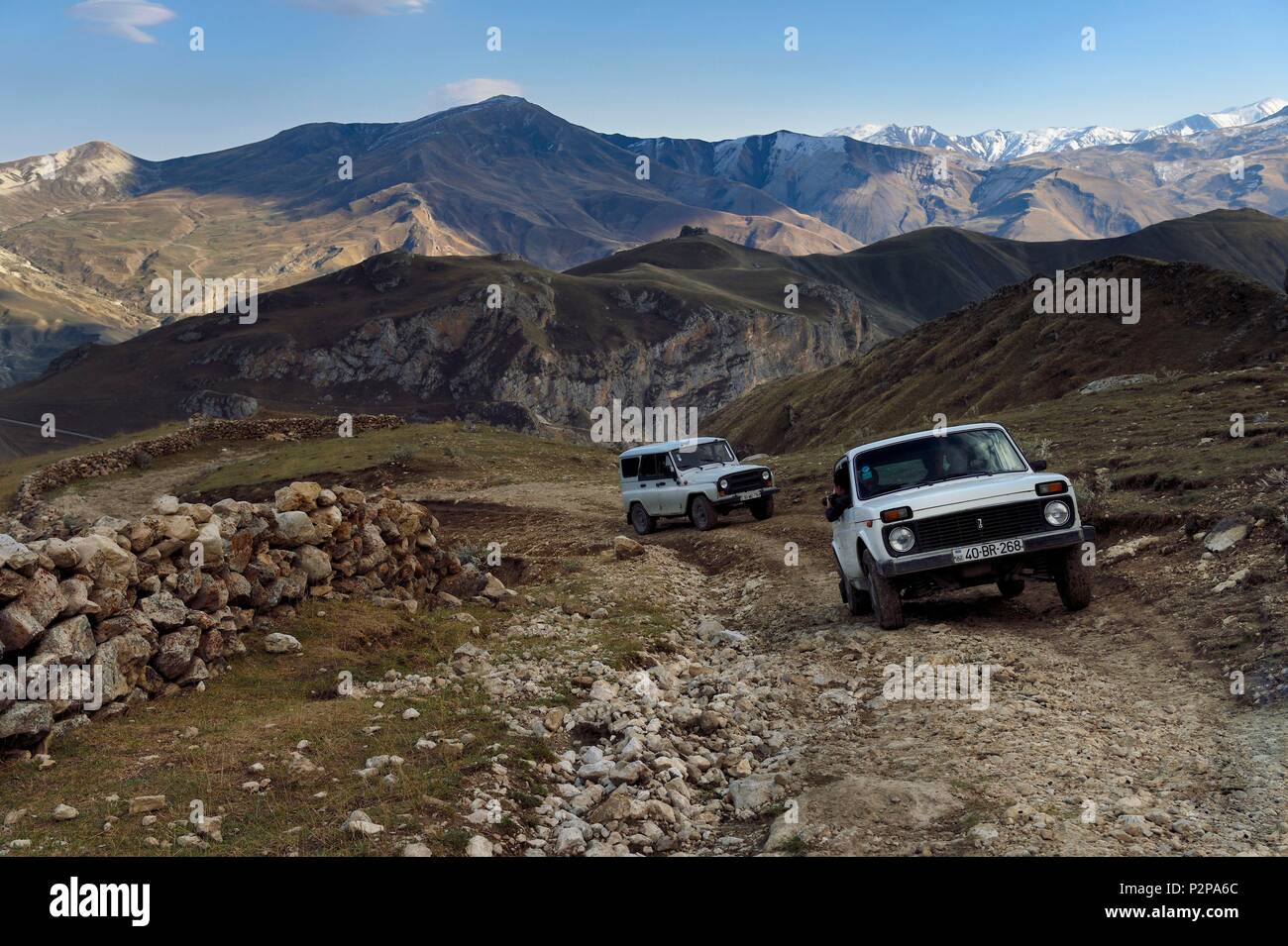 Azerbaijan, Quba (Guba) region, Greater Caucasus mountain range, four wheel drive on the track on the heights of the village of Qalaxudat Stock Photo