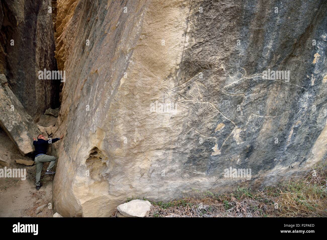 Azerbaijan, Gobustan, Gobustan National Park, Cultural Landscape of Gobustan Rock Art, Petroglyphs and Engravings in the Cave of the Bulls, Issa Smatti Stock Photo
