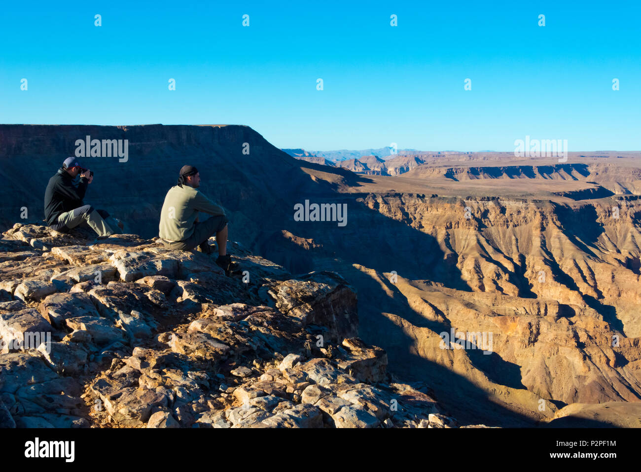 Tourist watching Fish Canyon in Kalahari Desert, Karas Region, Namibia Stock Photo