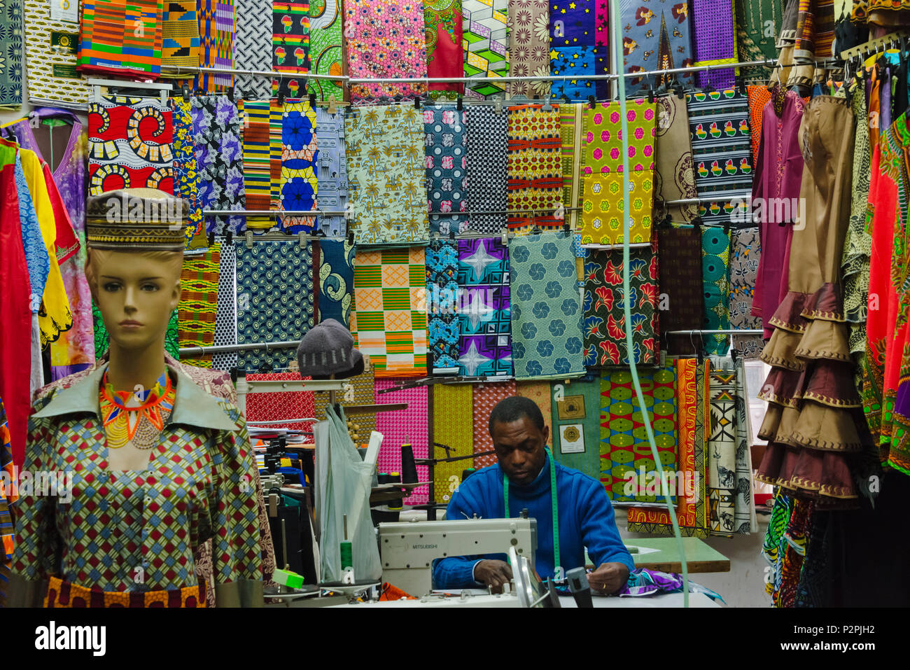 Tailor at a fabric shop, Cape Town, South Africa Stock Photo