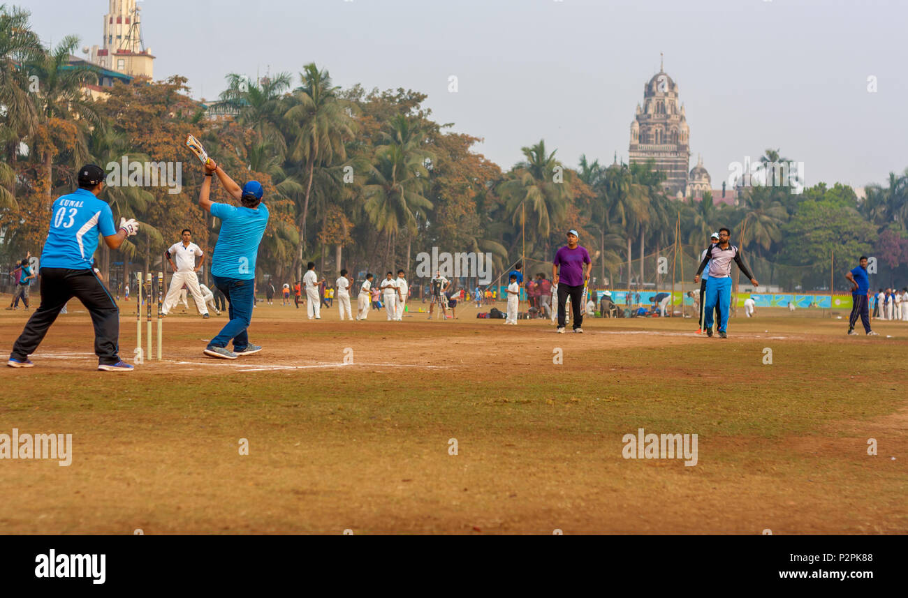 MUMBAI, INDIA JANUARY 14, 2017 Men playing cricket with tennis ball