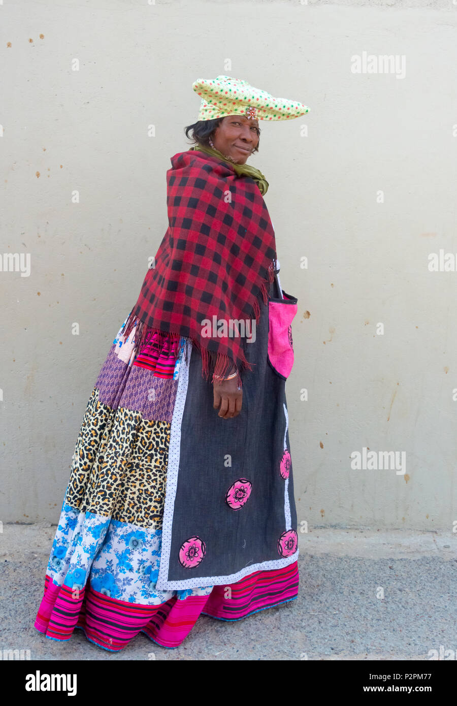 Herero woman in traditional clothing, Kamanjab, Kuene Region, Namibia Stock Photo