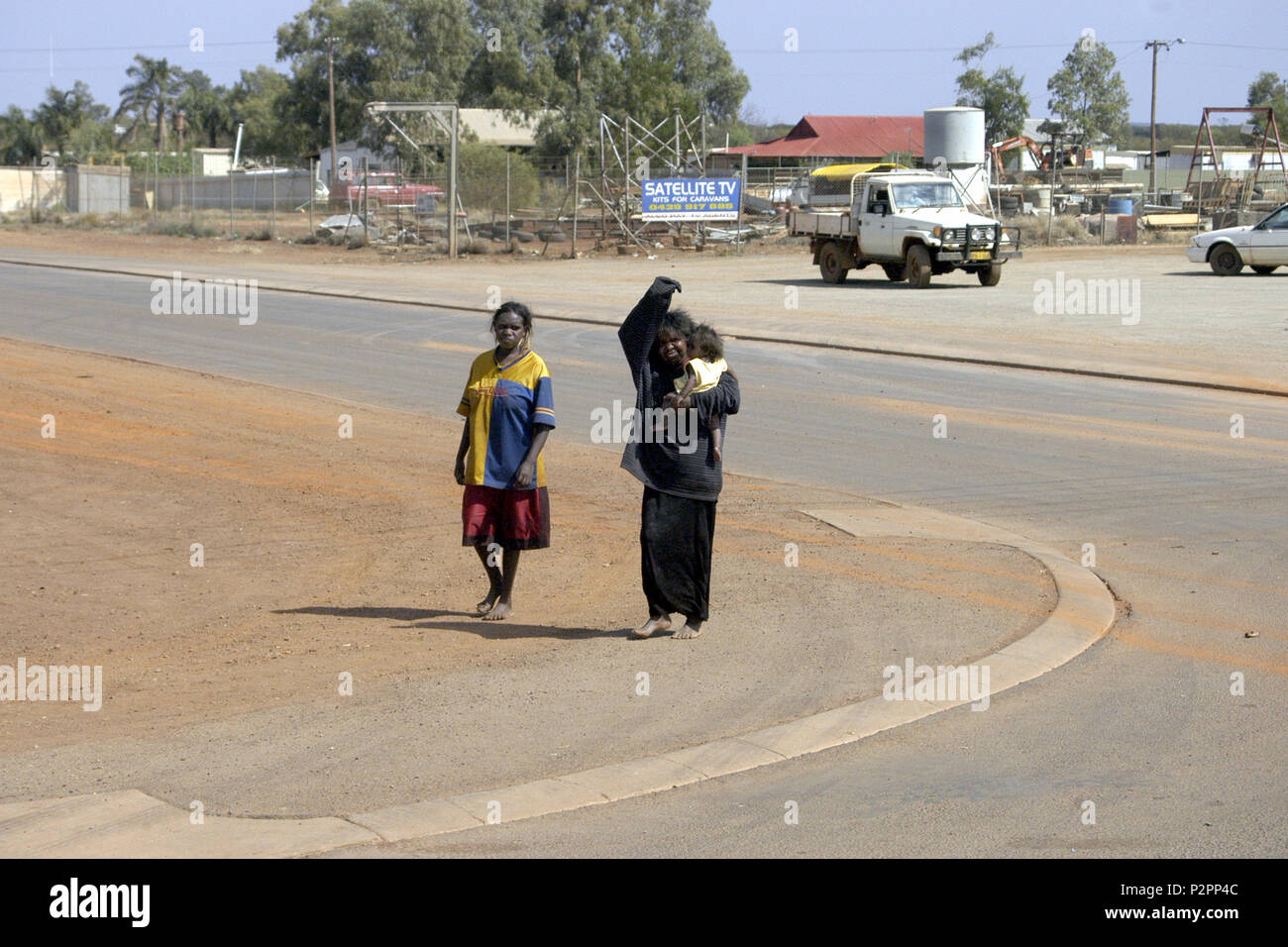 Aboriginal women in the town of Willuna in Western Australia. Willuna is a service areal for the local Aboriginal people. Stock Photo