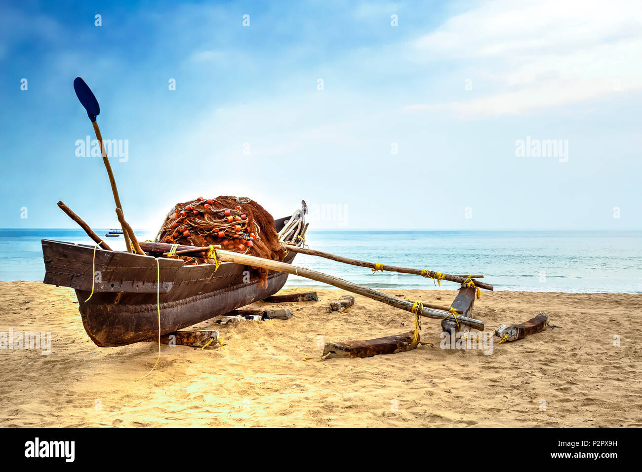 Traditional fishing boat on Goa beach, India Stock Photo Alamy