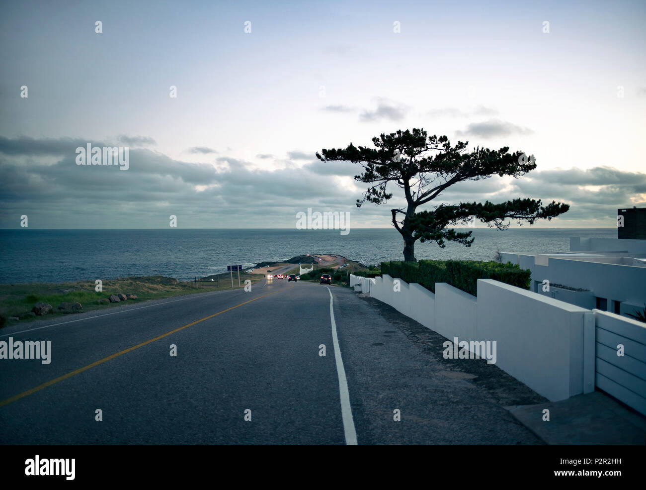 Road leading down on Punta Ballena, Uruguay. Stock Photo