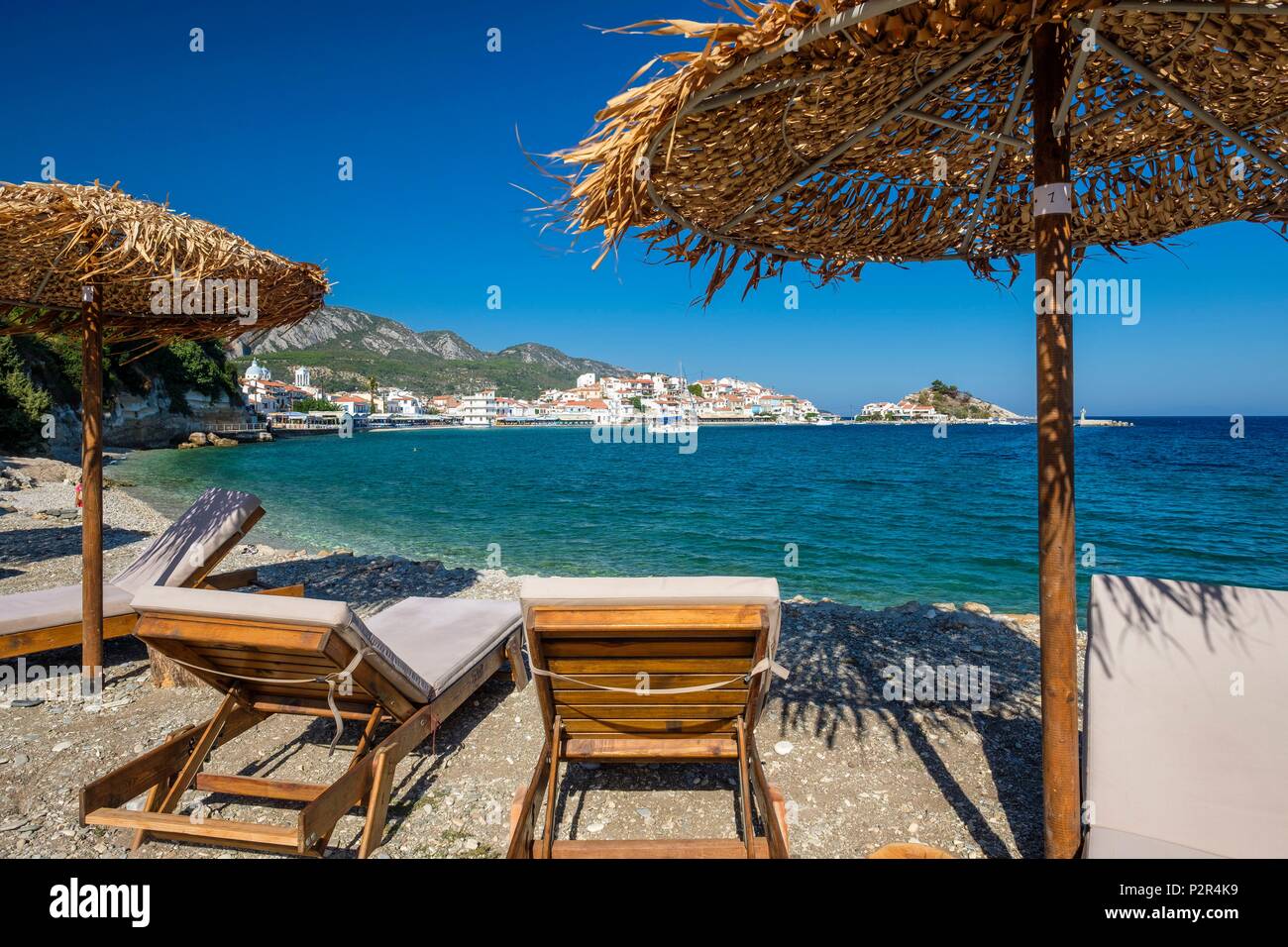 Greece, Samos island, Kokkari, picturesque village on the north coast, pebbles beach close to the harbour Stock Photo