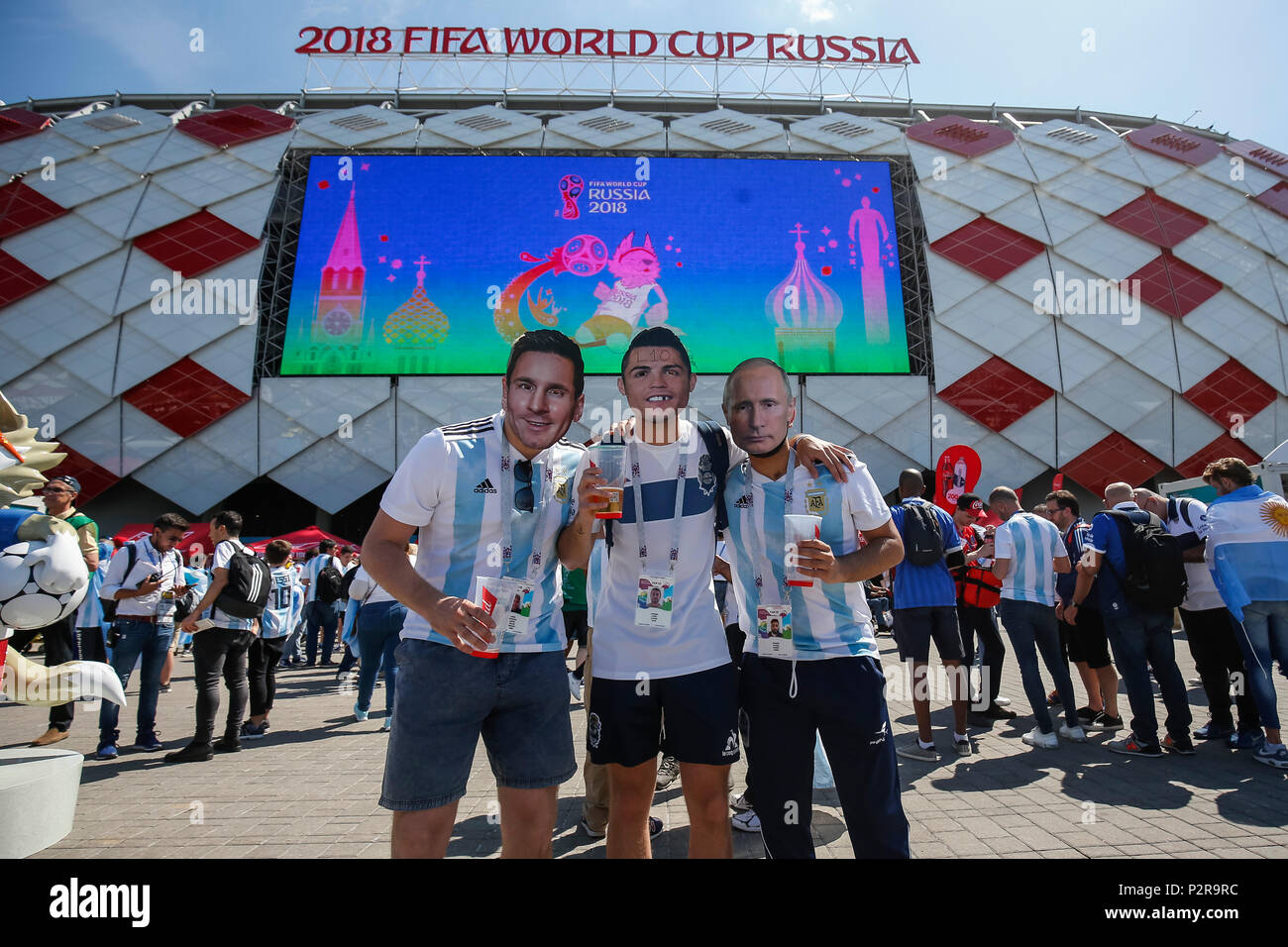 Moscow, Russia. 16th Jun, 2018. Argentina fans pose in Lionel Messi, Cristiano Ronaldo and Vladimir Putin masks before the 2018 FIFA World Cup Group D match between Argentina and Iceland at Spartak Stadium on June 16th 2018 in Moscow, Russia. (Photo by Daniel Chesterton/phcimages.com) Credit: PHC Images/Alamy Live News Stock Photo