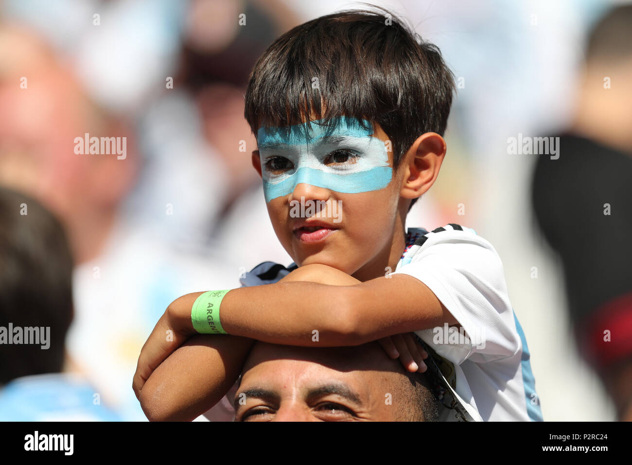 Young Argentina fan watching the game ARGENTINA V ICELAND ARGENTINA V ICELAND, 2018 FIFA WORLD CUP RUSSIA 16 June 2018 GBC8104 2018 FIFA World Cup Russia Spartak Stadium Moscow STRICTLY EDITORIAL USE ONLY. If The Player/Players Depicted In This Image Is/Are Playing For An English Club Or The England National Team. Then This Image May Only Be Used For Editorial Purposes. No Commercial Use. The Following Usages Are Also Restricted EVEN IF IN AN EDITORIAL CONTEXT: Use in conjuction with, or part of, any unauthorized audio, video, data, fixture lists, club/league logos, Betting, Stock Photo