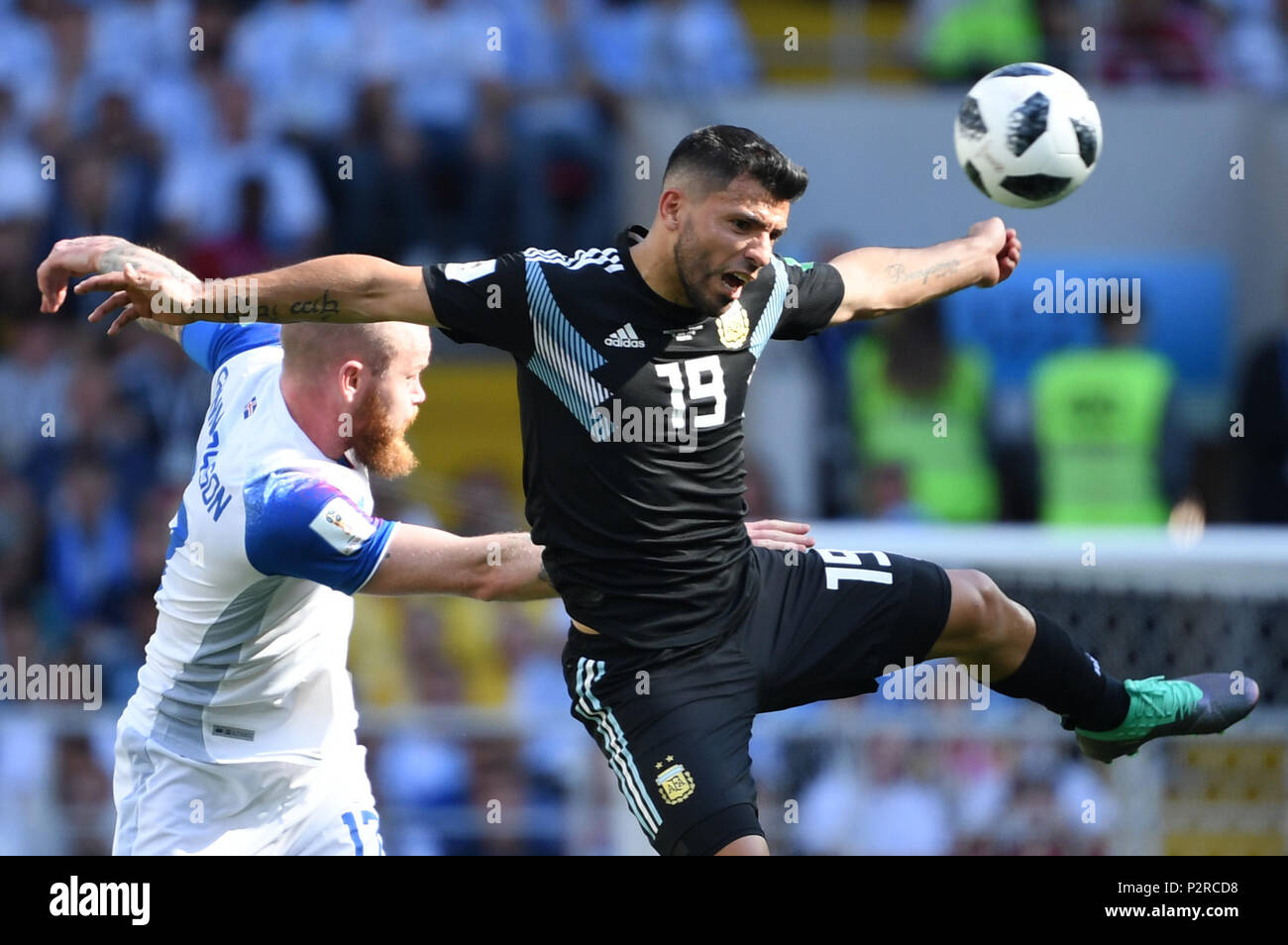 Moscow, Russia. 16th Jun, 2018. Moscow, Russia. 16 June 2018, Russia, Moscow, Soccer, FIFA World Cup 2018, Group D, Matchday 1 of 3, Argentina vs Iceland at the Spartak Stadium: Sergio Agüero from Argentina (R) and Aron Einar Gunnarsson from Iceland fight for the ball. Photo: Federico Gambarini/dpa Credit: dpa picture alliance/Alamy Live News Stock Photo