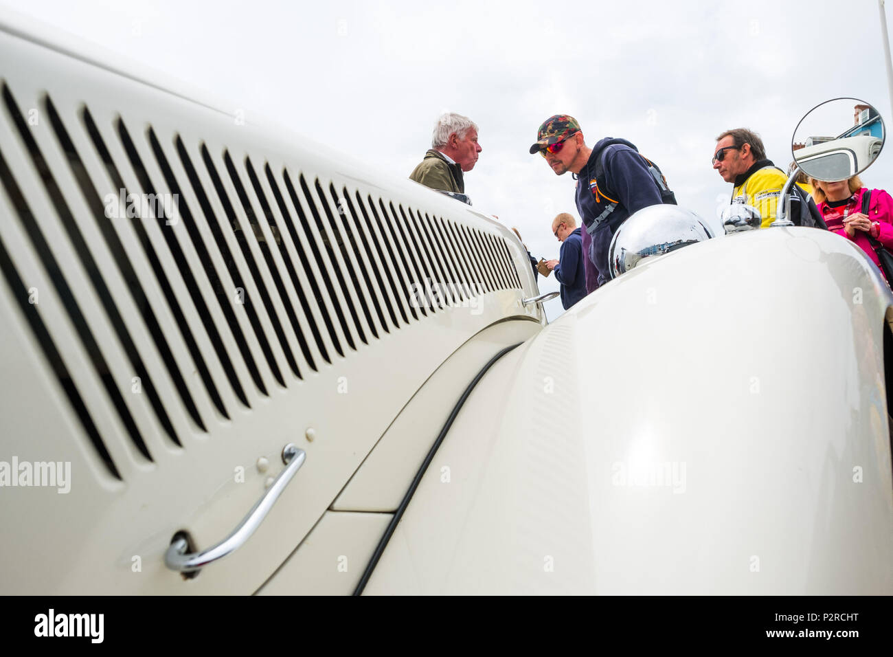 Aberystwyth Wales UK Saturday 16 June 2018  People on the promenade in Aberystwyth admiring the classic clean lines of a 1955 Citreon 'Light 15' in a charity  car rally organized by the local branch of the Rotary Club.    photo © Keith Morris / Alamy Live News Stock Photo