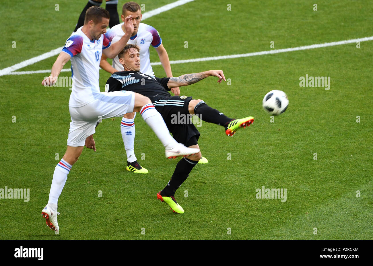 Moscow, Russia. 16th June, 2018. Lucas Biglia (C) of Argentina competes during a group D match between Argentina and Iceland at the 2018 FIFA World Cup in Moscow, Russia, June 16, 2018. Credit: Wang Yuguo/Xinhua/Alamy Live News Stock Photo