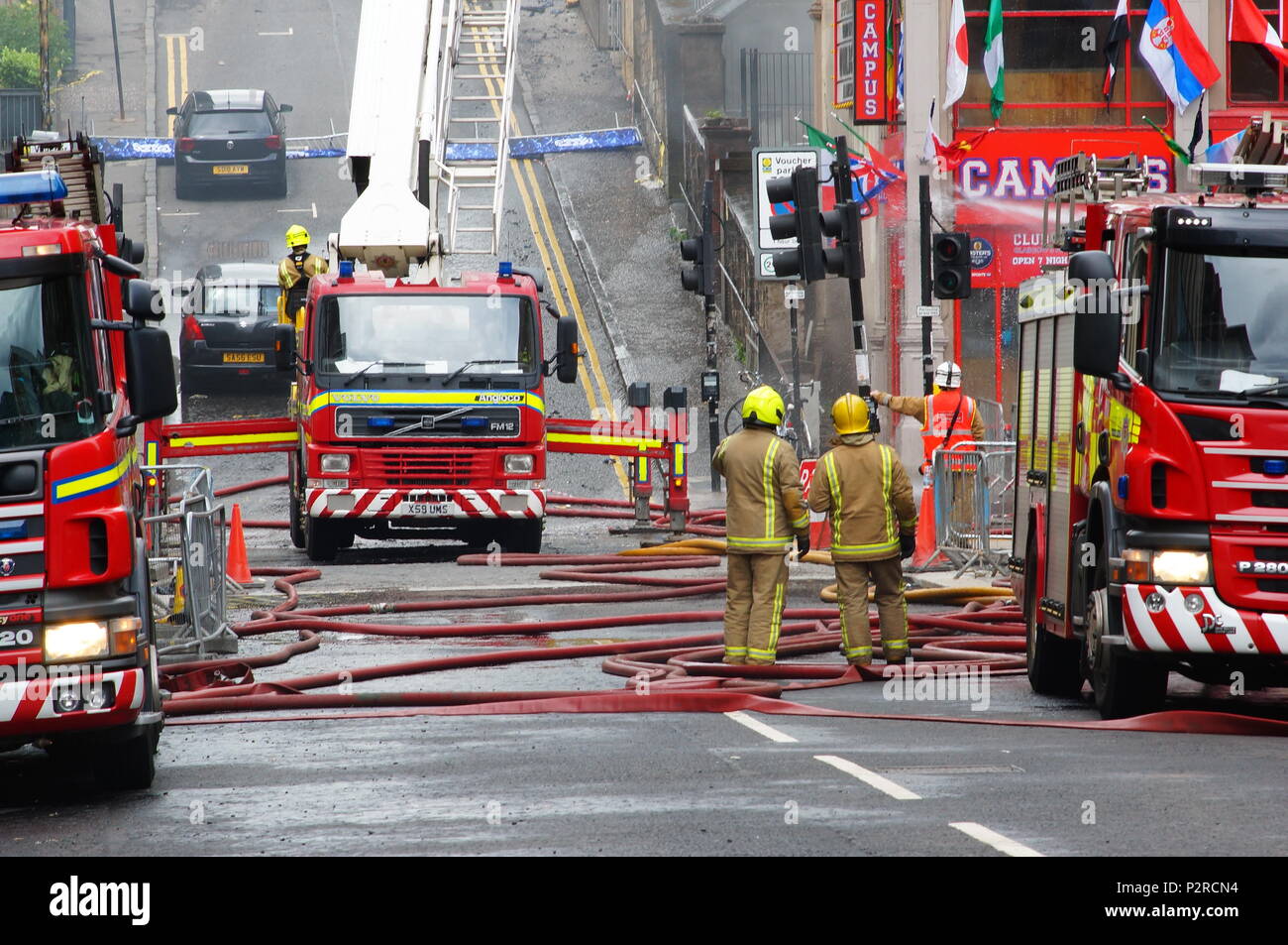 Glasgow, UK. 16th Jun, 2018. Emergency services still at the scene over 24 hours after the blaze began. 120 firefighters and 20 fire engines were called to the scene at around 11:20pm last night. Credit: Pawel Pietraszewski/Alamy Live News Stock Photo