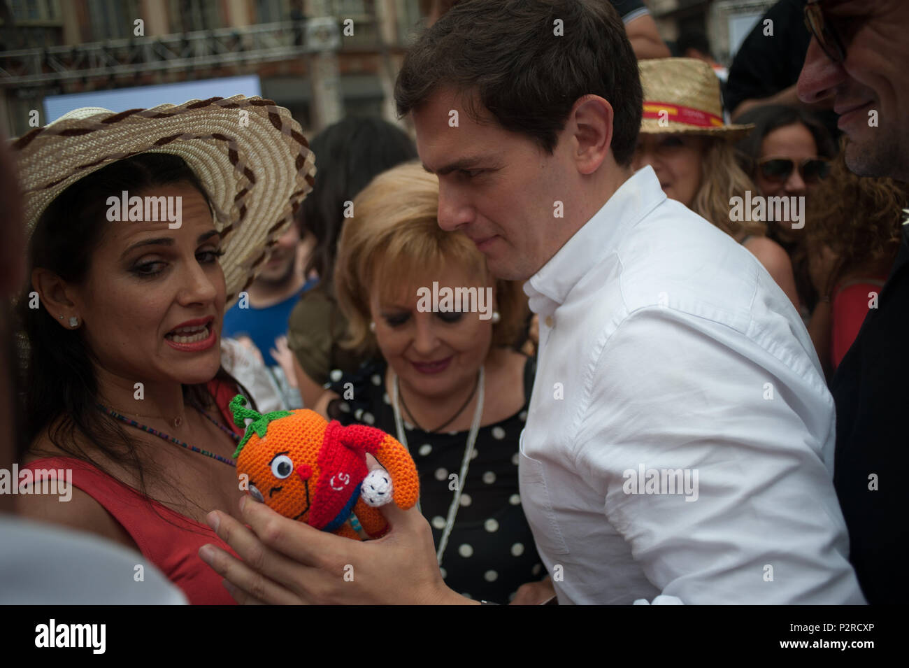 June 16, 2018 - Malaga, Spain - Ciudadanos party leader Albert Rivera receives a toy with the figure of 'Naranjito' (the spanish mascot of Soccer World Cup in the year 1982), after he participated in an event to present the new platform named 'EspaÃ±a Ciudadana' (citizen Spain) after his official presentation in Madrid. According to Ciudadanos, the platform borned with the purpose to form a new common project with all Spanish and to regain the proud of being spanish. (Credit Image: © Jesus Merida/SOPA Images via ZUMA Wire) Stock Photo