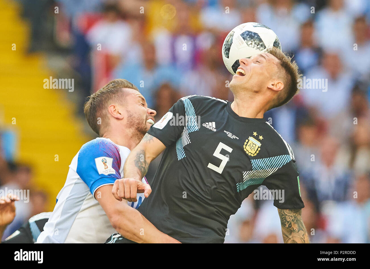 Moscow, Russia. 16th Jun, 2018. Argentina- Iceland, Soccer, Moscow, June 16, 2018 Lucas BIGLIA, Argentina 5   compete for the ball, tackling, duel, header against Kari ARNASON, ISL 14  ARGENTINA - ICELAND FIFA WORLD CUP 2018 RUSSIA, Season 2018/2019,  June 16, 2018 S p a r t a k Stadium in Moscow, Russia.  © Peter Schatz / Alamy Live News Stock Photo