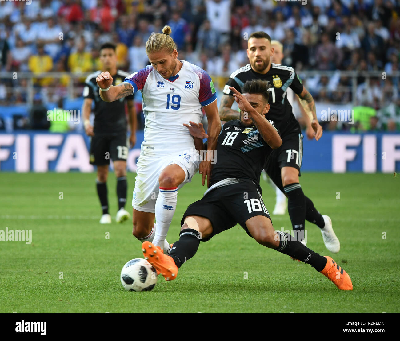 Moscow, Russia. 16th June, 2018. Rurik Gislason (L front) of Iceland vies with Eduardo Salvio (R front) of Argentina during a group D match between Argentina and Iceland at the 2018 FIFA World Cup in Moscow, Russia, June 16, 2018. Credit: Du Yu/Xinhua/Alamy Live News Stock Photo