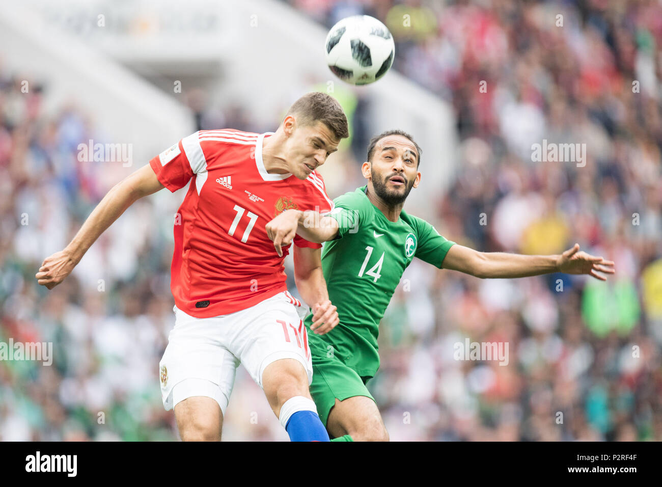 Roman ZOBNIN (left, RUS) versus Abdullah OTAYF (KSA), action, duels, header duel, Russia (RUS) - Saudi Arabia (KSA) 5: 0, preliminary round, group A, match 1, on 14.06.2018 in Moscow ; Football World Cup 2018 in Russia from 14.06. - 15.07.2018. | usage worldwide Stock Photo