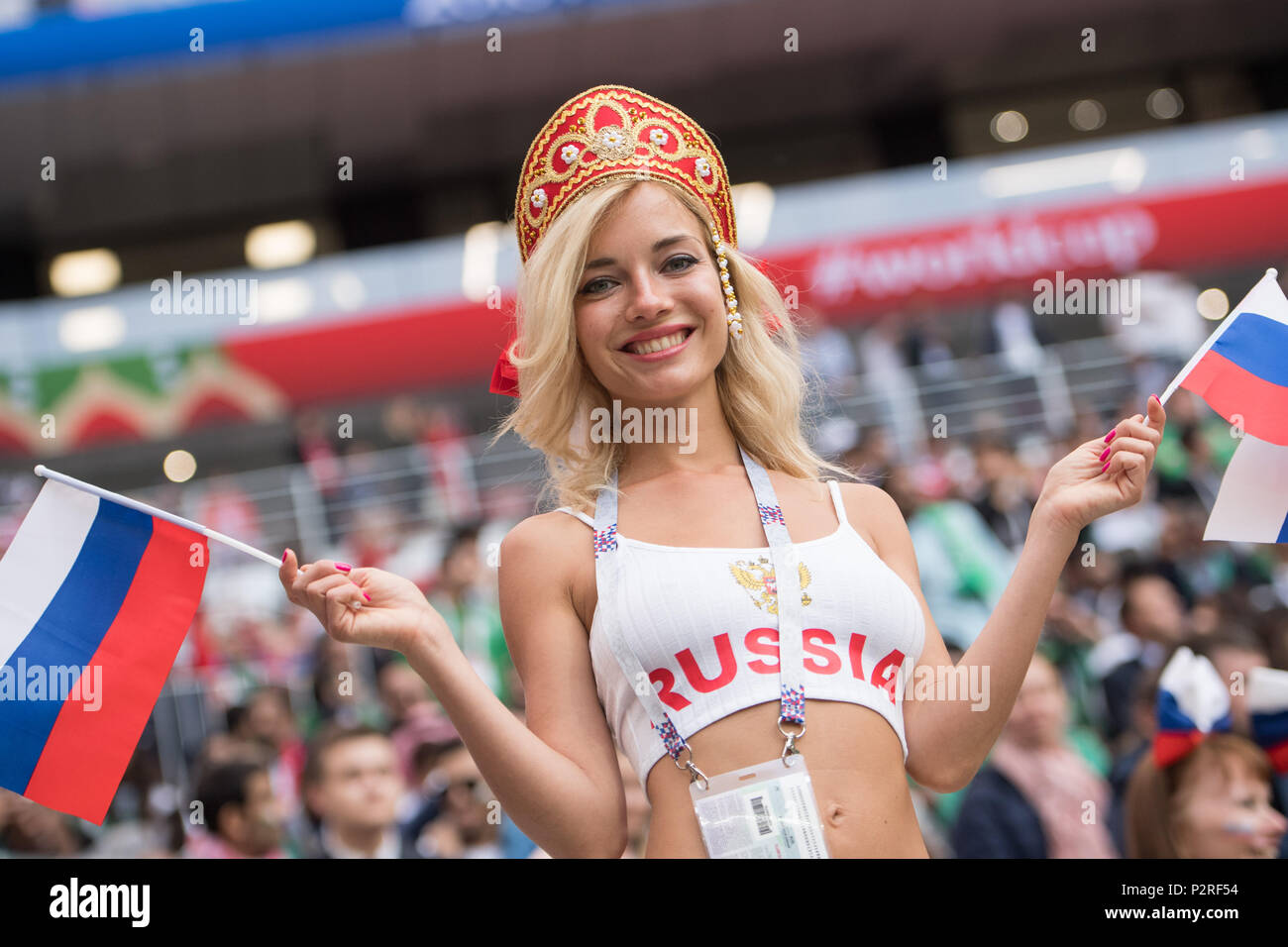Russian Fan with Flags, Half Figure, Half Figure, Fan, Fans, Spectators, Supporters, Supporter, Female, Female, Russia (RUS) - Saudi Arabia (KSA) 5: 0, Preliminary Round, Group A, Game 1, at 14.06. 2018 in Moscow; Football World Cup 2018 in Russia from 14.06. - 15.07.2018. | usage worldwide Stock Photo