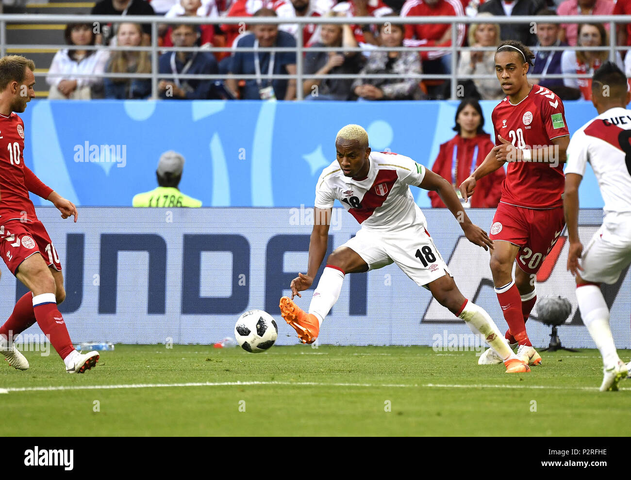 Saransk, Russia. 16th June, 2018. Andre Carrillo (C) of Peru competes during a group C match between Peru and Denmark at the 2018 FIFA World Cup in Saransk, Russia, June 16, 2018. Credit: He Canling/Xinhua/Alamy Live News Stock Photo