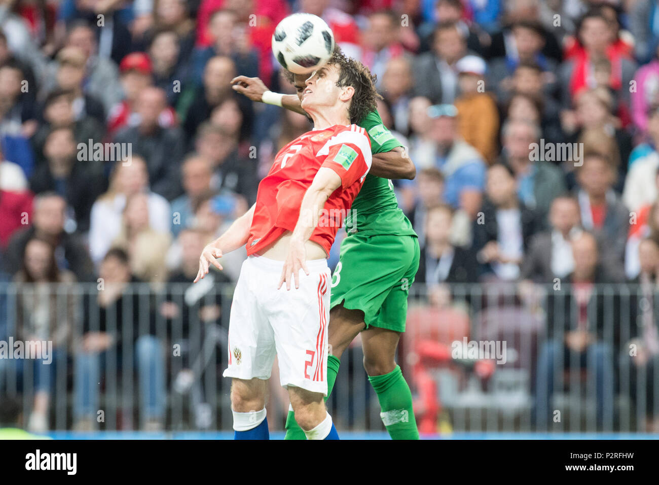 Mario FERNANDES (left, RUS) versus Yasir ALSHAHRANI (KSA), Action, duels, Head Duel, Russia (RUS) - Saudi Arabia (KSA) 5: 0, Preliminary Round, Group A, Match 1, on 14.06.2018 in Moscow ; Football World Cup 2018 in Russia from 14.06. - 15.07.2018. | usage worldwide Stock Photo