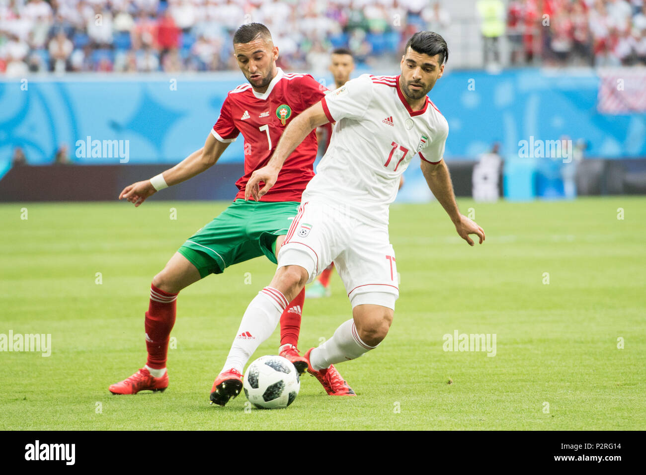 Hakim ZIYACH (left, MAR) versus Mehdi TAREMI (IRN), action, duels, Morocco (MAR) - Iran (IRN) 0: 1, preliminary round, group B, game 4, on 15.06.2018 in St.Petersburg; Football World Cup 2018 in Russia from 14.06. - 15.07.2018. | usage worldwide Stock Photo