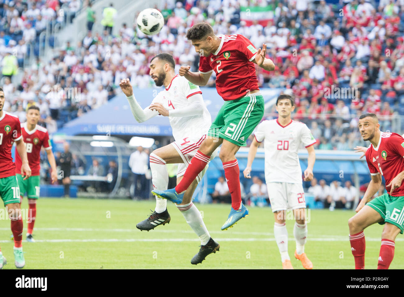 Roozbeh CHESHMI (left, IRN) has the second offense versus Achraf HAKIMI (MAR), action, duels, header duel, Morocco (MAR) - Iran (IRN) 0: 1, preliminary round, group B, game 4, on 06/15/2018 in St. Petersburg; Football World Cup 2018 in Russia from 14.06. - 15.07.2018. | usage worldwide Stock Photo