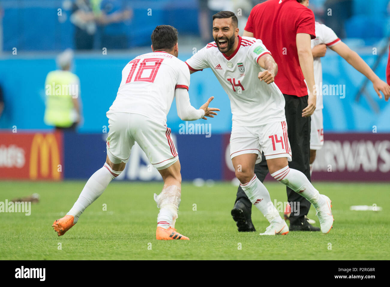 Alireza JAHANBAKHSH (left, IRN) and and Saman GHODDOS (IRN) cheer after the game ends, jubilation, cheering, cheering, joy, cheers, celebrate, final jubilation, full figure, Morocco (MAR) - Iran (IRN) 0: 1 , Preliminary round, group B, match 4, on 15.06.2018 in St.Petersburg; Football World Cup 2018 in Russia from 14.06. - 15.07.2018. | usage worldwide Stock Photo
