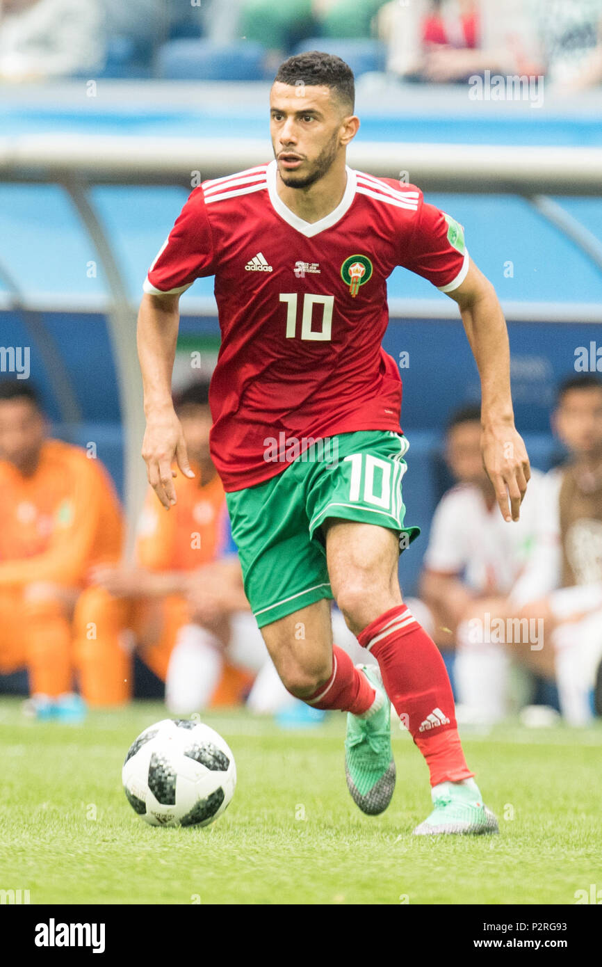 Younes BELHANDA (MAR) with Ball, Single Action with Ball, Action, Full Figure, Portrait, Morocco (MAR) - Iran (IRN) 0: 1, Preliminary Round, Group B, Match 4, on 15.06.2018 in St.Petersburg; Football World Cup 2018 in Russia from 14.06. - 15.07.2018. | usage worldwide Stock Photo