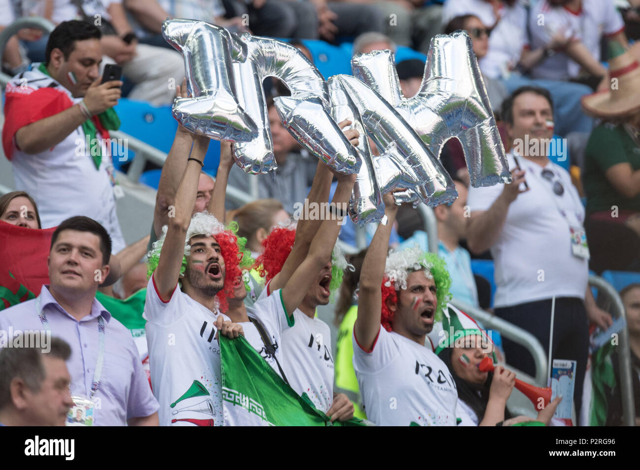Iranian fans hold the bushes IRAN high, jubilation, cheer, cheering, joy, cheers, celebrate, half figure, half figure, gesture, gesture, Morocco (MAR) - Iran (IRN) 0: 1, preliminary round, group B, game 4, on 15.06.2018 in St.Petersburg; Football World Cup 2018 in Russia from 14.06. - 15.07.2018. | usage worldwide Stock Photo