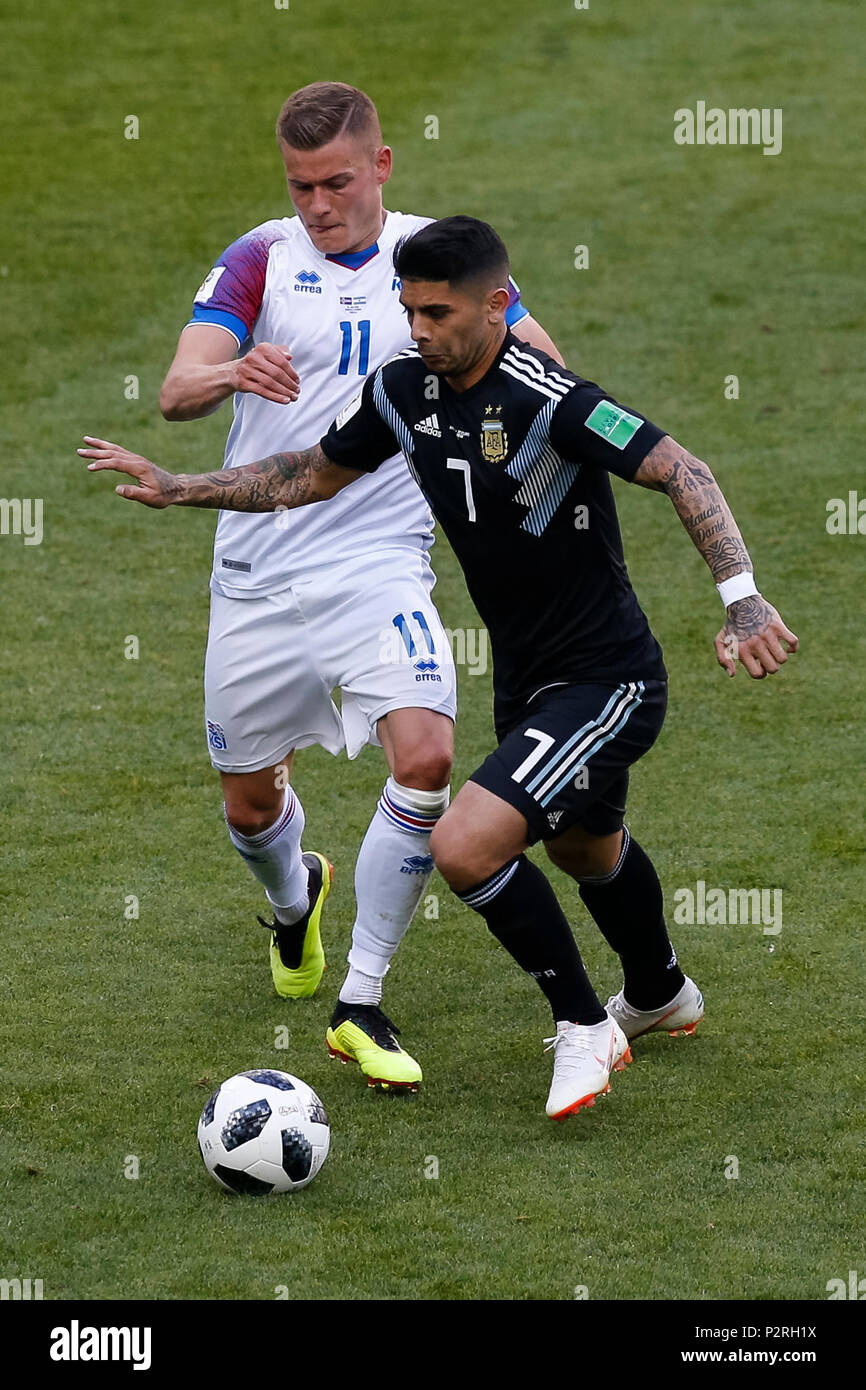 Moscow, Russia. 16th Jun, 2018. Alfred Finnbogason of Iceland and Ever Banega of Argentina during the 2018 FIFA World Cup Group D match between Argentina and Iceland at Spartak Stadium on June 16th 2018 in Moscow, Russia. (Photo by Daniel Chesterton/phcimages.com) Credit: PHC Images/Alamy Live News Stock Photo