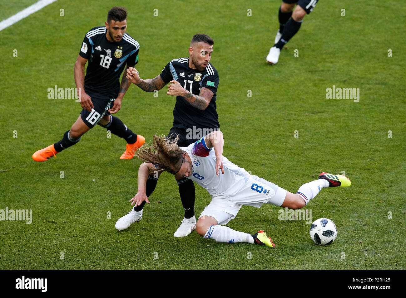 Moscow, Russia. 16th Jun, 2018. Birkir Bjarnason of Iceland is tackled by Nicolas Otamendi of Argentina and Eduardo Salvio of Argentina during the 2018 FIFA World Cup Group D match between Argentina and Iceland at Spartak Stadium on June 16th 2018 in Moscow, Russia. (Photo by Daniel Chesterton/phcimages.com) Credit: PHC Images/Alamy Live News Stock Photo