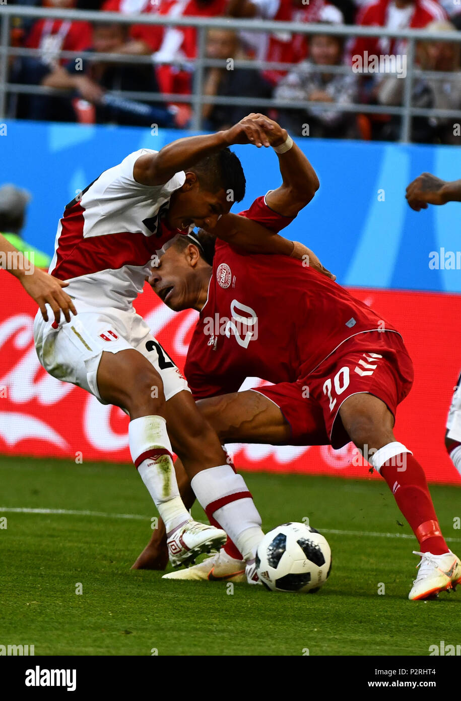 Mordovia Arena, Mordovia, Russia. 16th June, 2018. FIFA World Cup Football, Group C, Peru versus Denmark; Yussuf Yurary Poulsen of Denmark and Edison Flores of Peru fighting about the ball Credit: Action Plus Sports/Alamy Live News Stock Photo
