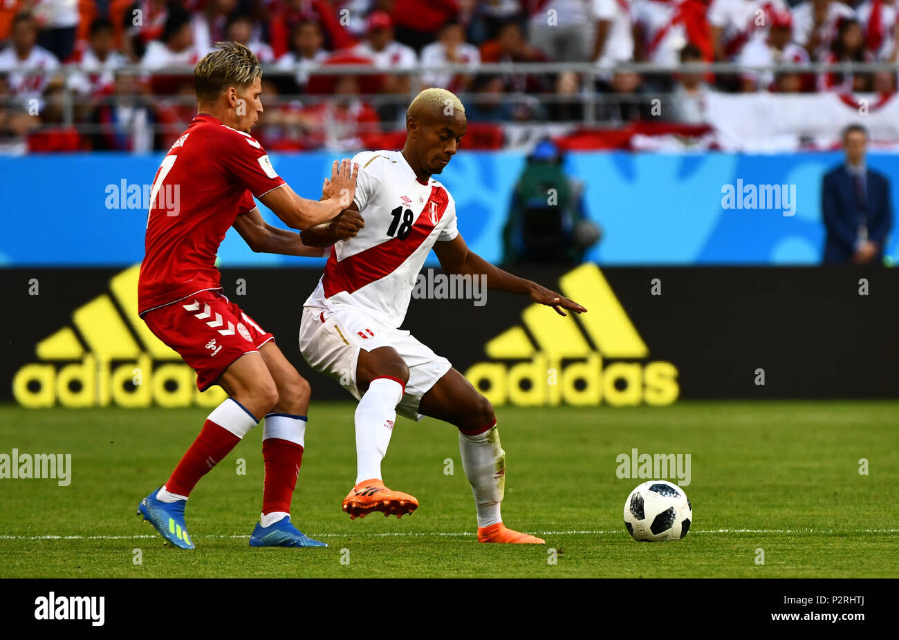Mordovia Arena, Mordovia, Russia. 16th June, 2018. FIFA World Cup Football, Group C, Peru versus Denmark; Jens Stryger Larsen of Denmark and Andre Carrillo of Peru fight for the ball Credit: Action Plus Sports/Alamy Live News Stock Photo