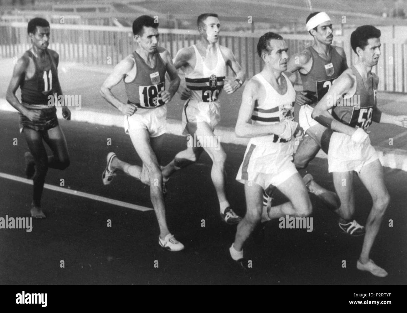 . Abebe Bikila running the 1960 Olympic marathon . 1960. Unknown (ANSA.it) 3 Abebe Bikila 1960 Olympics Stock Photo