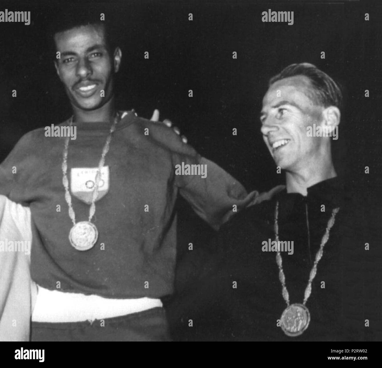 . Barry Magee (right) and Abebe Bikila at the 1960 Olympics . 1960. Unknown (ANSA.it) 3 Abebe Bikila, Barry Magee 1960 Stock Photo