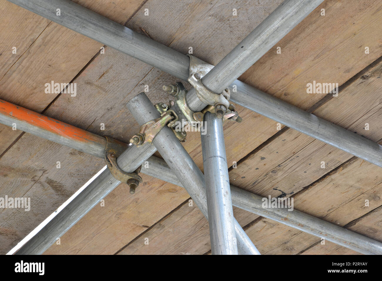 Scaffolding pipe crossing on a Scaffold tower looking up from