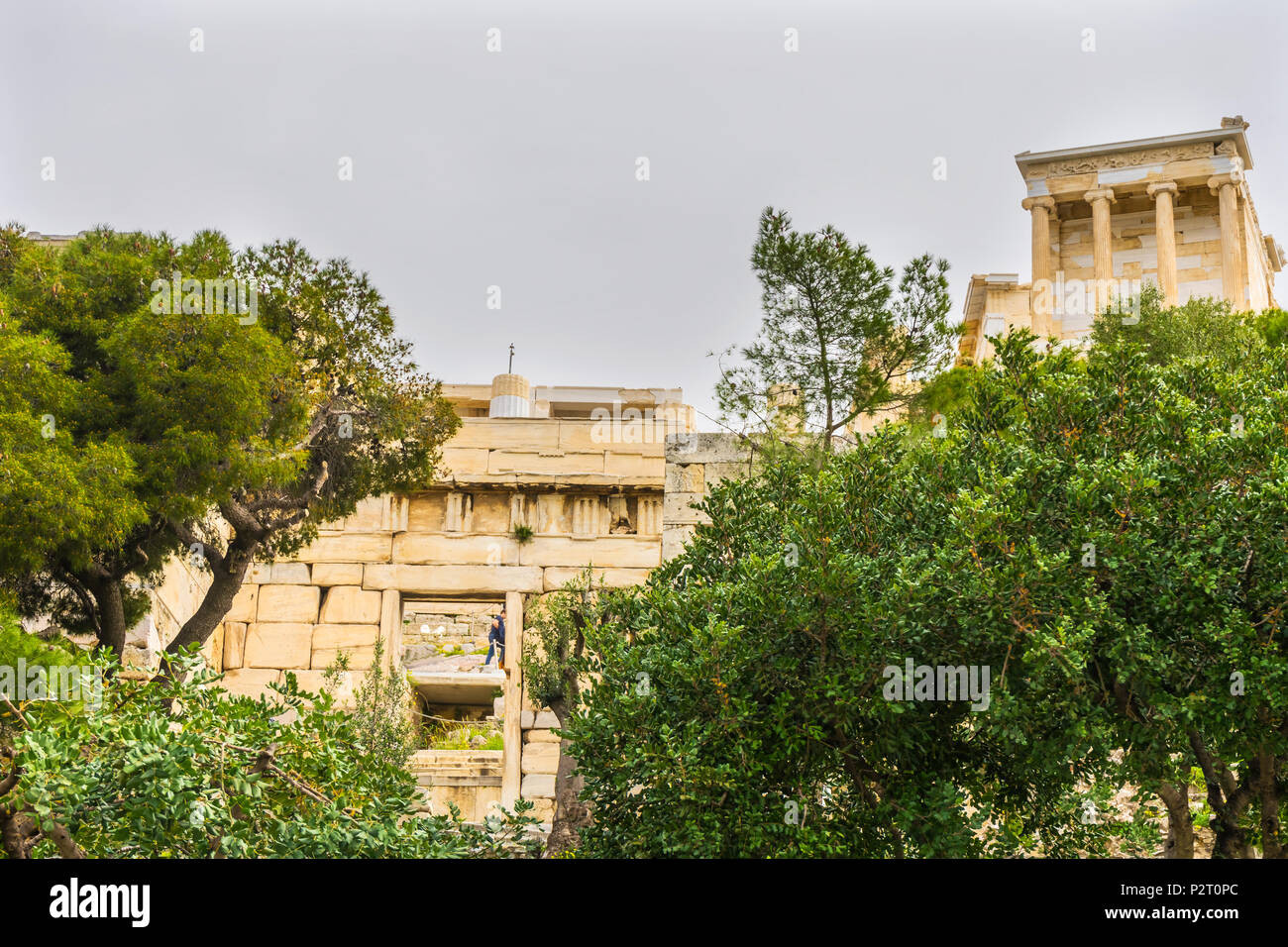 Temple of Athena Nike Propylaea Ancient Entrance Gateway Olive Trees Ruins Acropolis Athens Greece Construction ended in 432 BC Temple built 420 BC.   Stock Photo